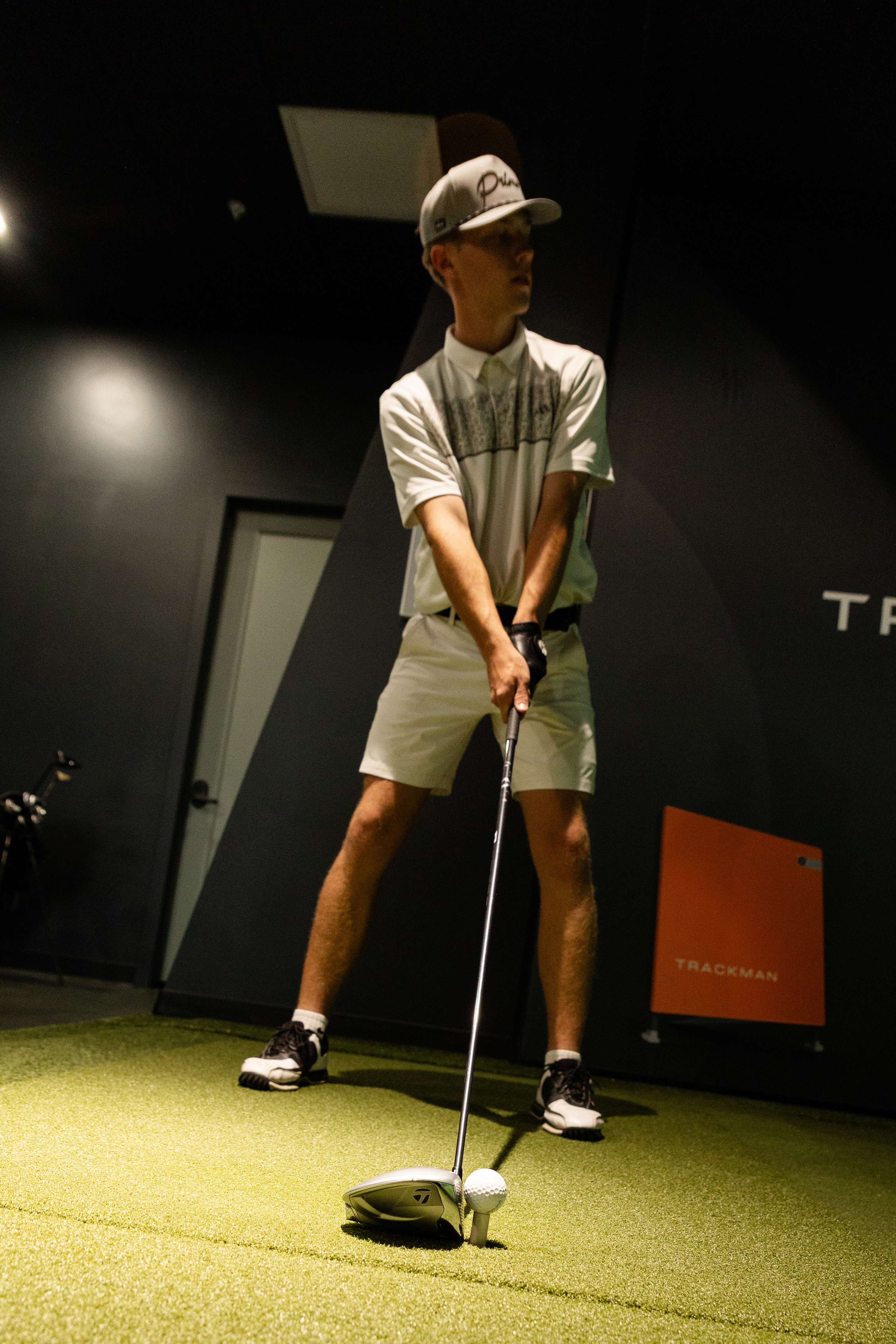 Golfer prepping before a shot