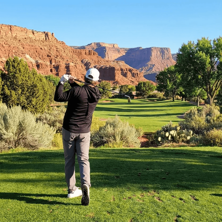 Golf instructor Kevin demonstrating swing technique at Virtual Greens St. George