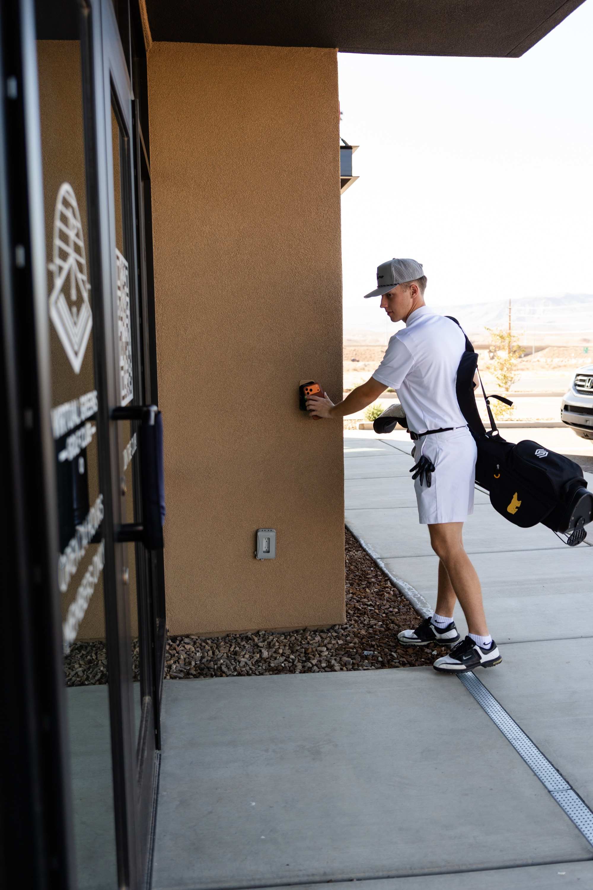 Virtual Greens members in a simulator bay